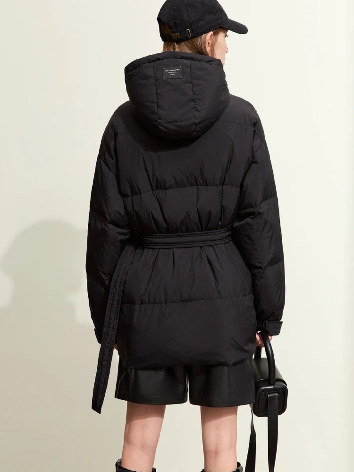Steppjacke für Damen mit Gürtel und Kapuze | WINTERALLURE